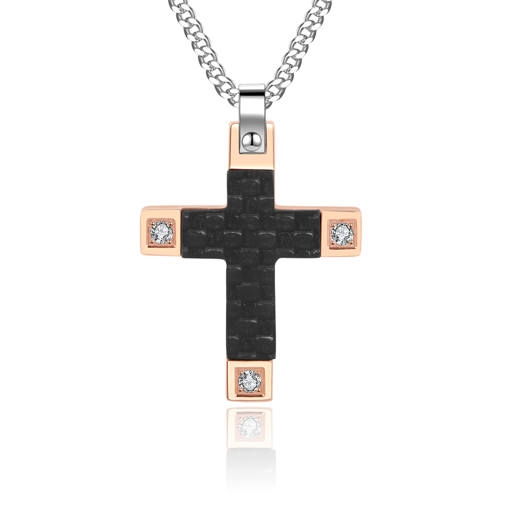 Two-tone cross pendant with rose gold edges and a textured black inlay, adorned with four crystals, suspended from a silver chain.