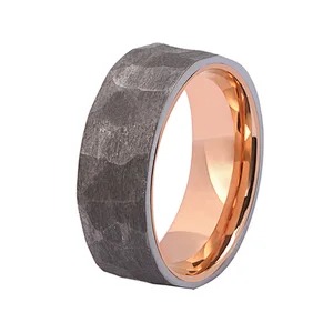 A gray ring with a rose gold interior