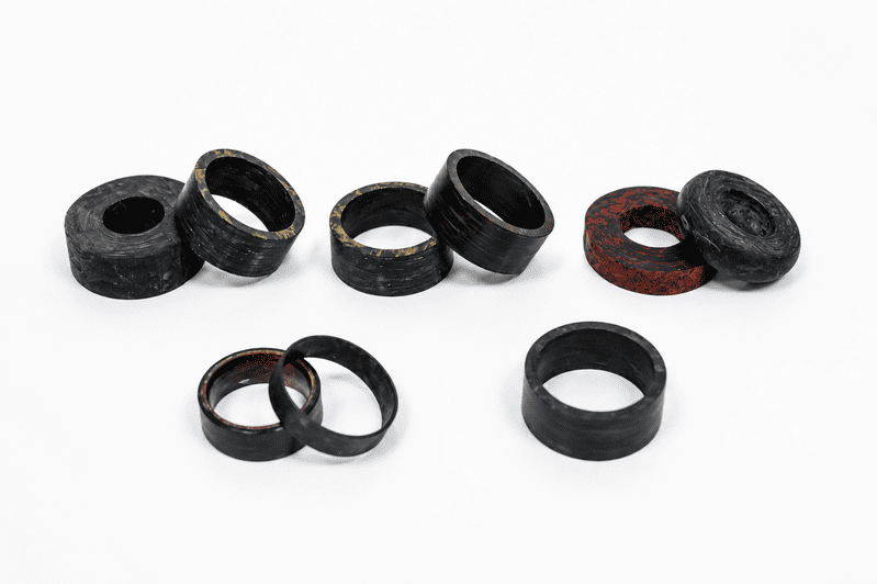 OEM production of carbon fiber wedding bands with forged carbon fiber and metal integration